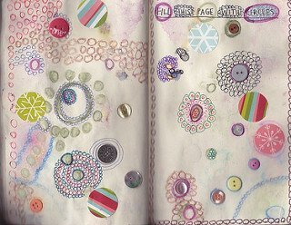 Buttons and circles on a journal page.