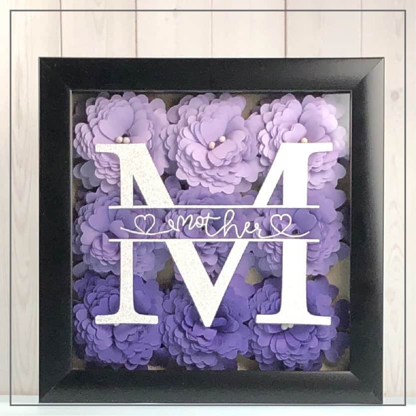 Mother's Day shadow box with rolled flowers and a monogram.