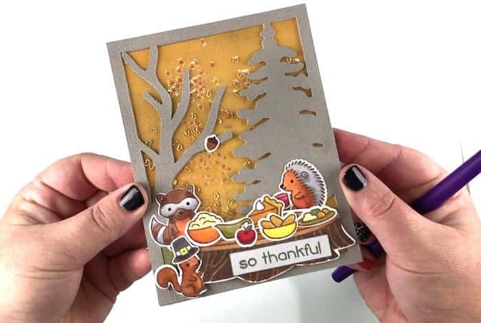Finished Thanksgiving card with Woodland Animals having a feast.