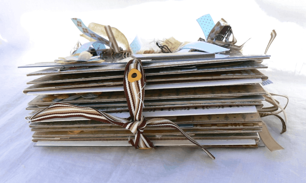 A creative journal with ribbons from the side