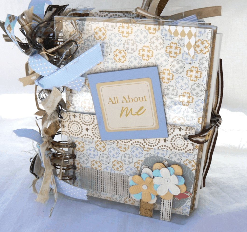 All about me journal with ribbons and paper flowers