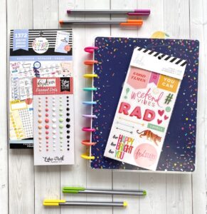rad stickers and a classic happy planner