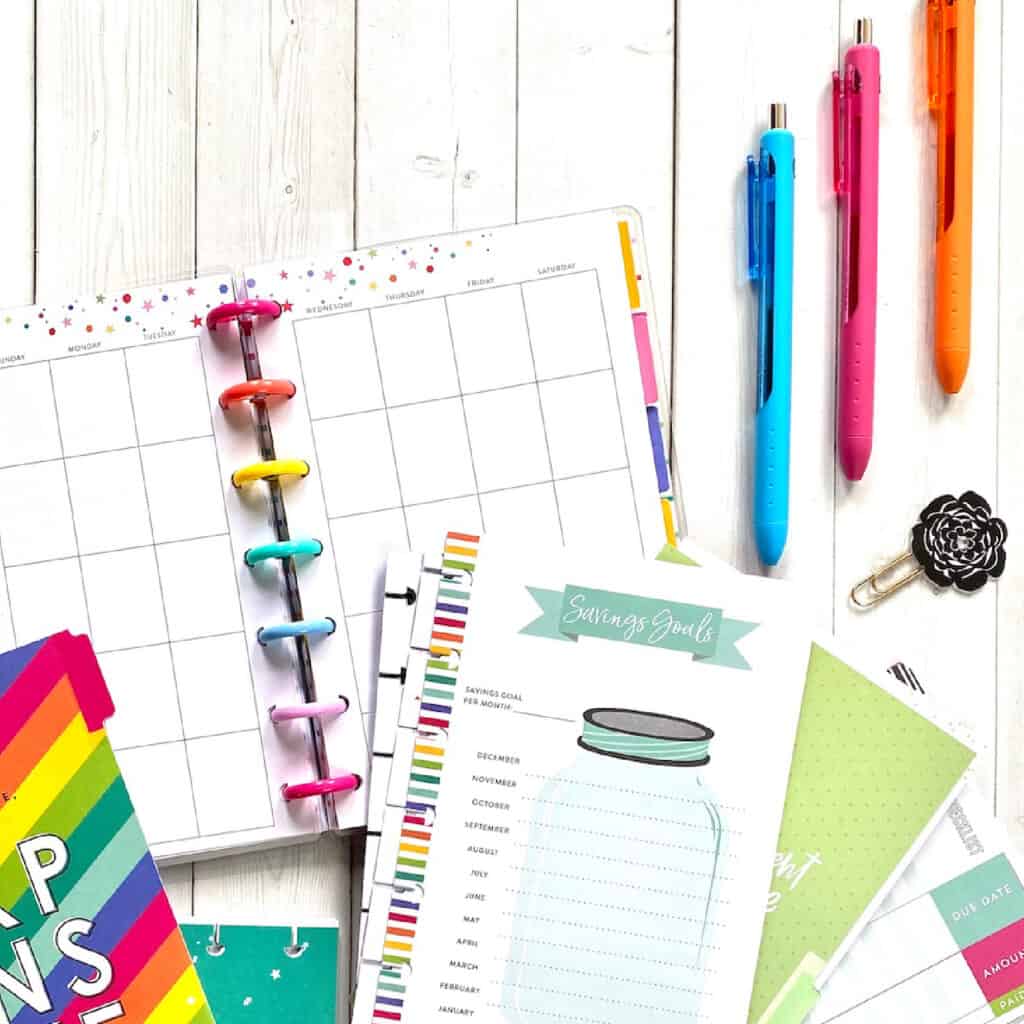 planner productivity with savings trackers and colorful pens