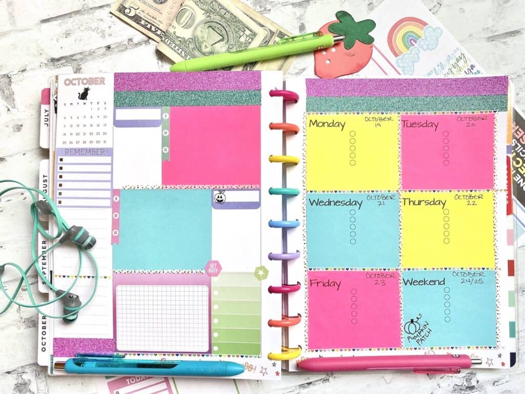 Planner pages with sticky notes, planner stickers, and washi tape.