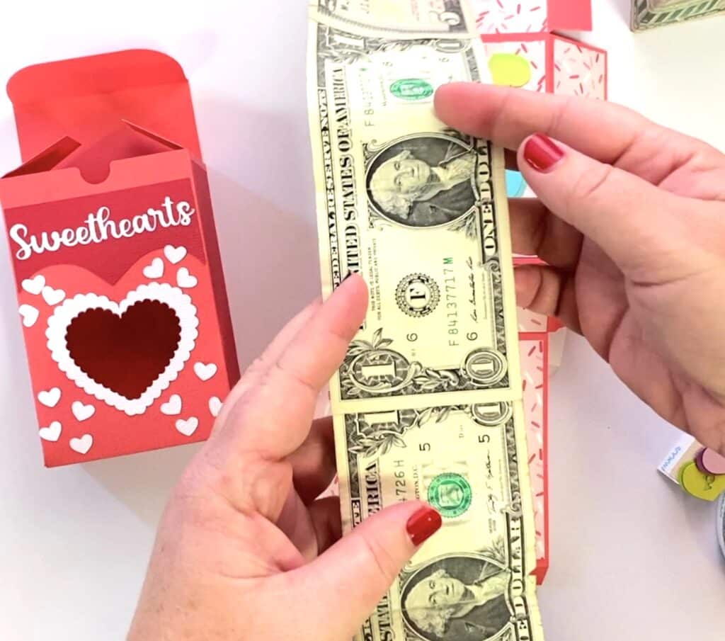 attaching-money-valentine-gift-roll