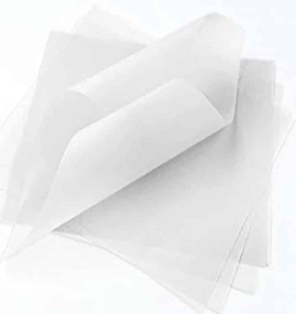 pile-of-vellum-specialty-scrapbook-paper